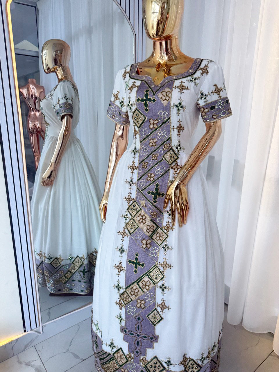Elegant Purple-Embroidered Ethiopian Dress