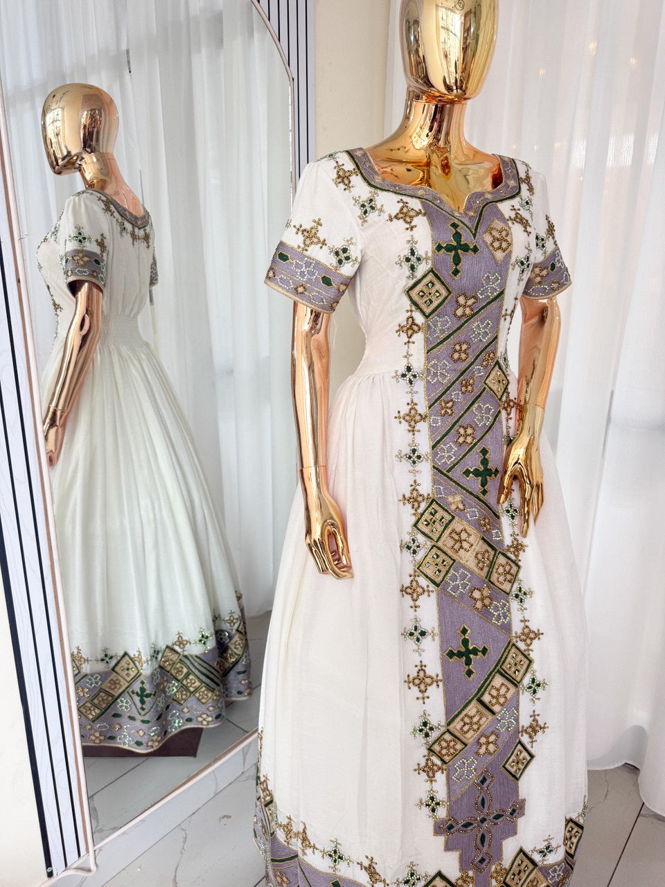 Elegant Purple-Embroidered Ethiopian Dress